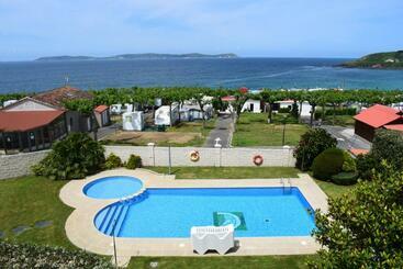 Отель Vida Playa Paxarinas