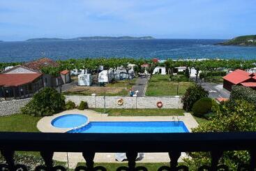Отель Vida Playa Paxarinas