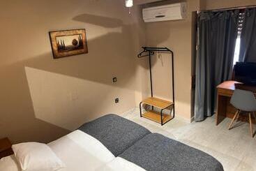Отель Hostal Arenal
