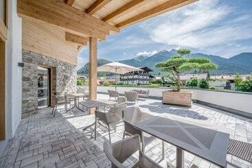 Отель Alpenparks Chalet & Apartment Alpina Seefeld