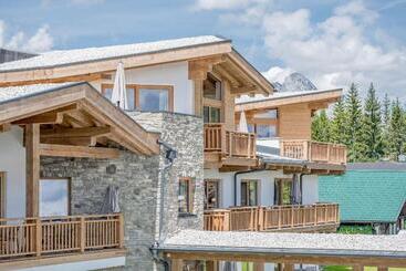 Отель Alpenparks Chalet & Apartment Alpina Seefeld