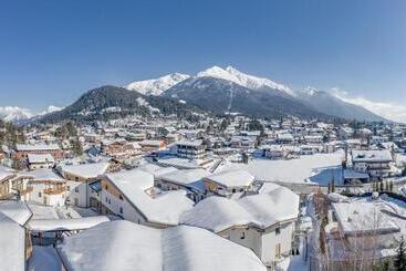Отель Alpenparks Chalet & Apartment Alpina Seefeld