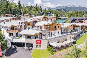 Отель Alpenparks Chalet & Apartment Alpina Seefeld