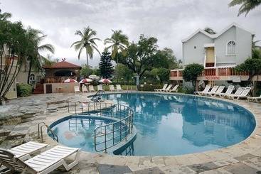 Whispering Palms Beach Resort