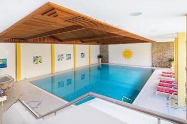 Отель Europa Suites St Moritz