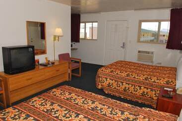 בית מלון כפרי Stone Inn Extended Stay U Of A