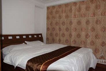 Dalian Xinghai Ingres Garden Apartment
