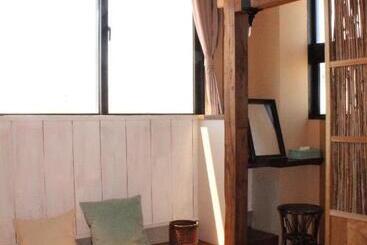 پانسیون Guest House Holoholo Ishigakijima