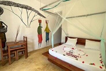 تختخواب و صبحانه Sky And Sand Zanzibar Beach Resort
