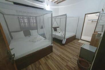 تختخواب و صبحانه Ondo House
