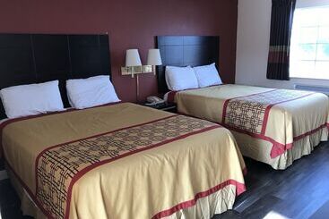 مُتل Manhattan Inn & Suites