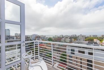 هتل Romney Park Luxury Apartments