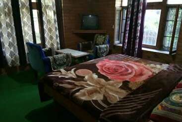 تختخواب و صبحانه Sunrise Cottage