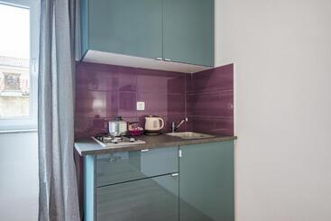 Top Center Rooms & Studio