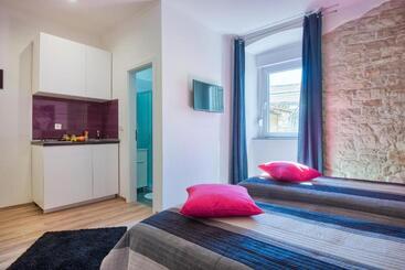 Top Center Rooms & Studio