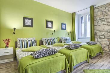 Top Center Rooms & Studio