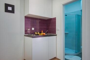Top Center Rooms & Studio