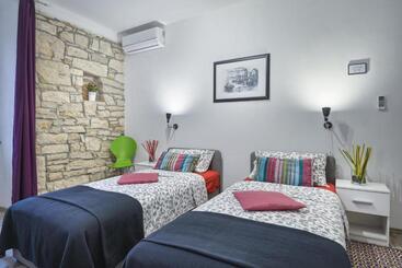 Top Center Rooms & Studio