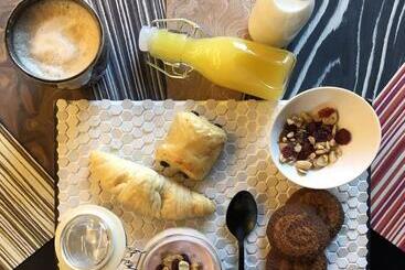 تختخواب و صبحانه Binariouno