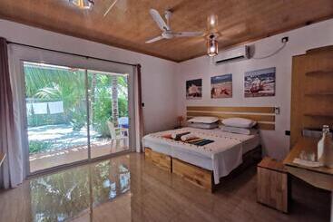 پانسیون Blue Water Thoddoo Inn