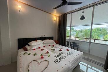 پانسیون Thoddoo White Sand Inn