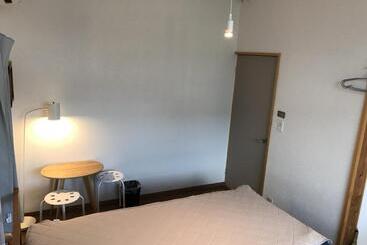تختخواب و صبحانه Tsushima White House