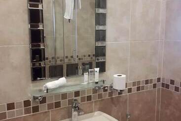 تختخواب و صبحانه Ekupholeni Garden Villas