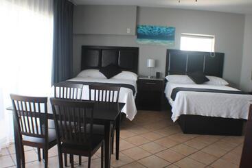 هتل The All New Grace Bay Suites