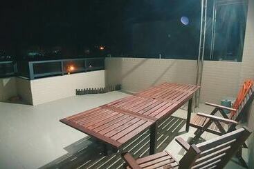 تختخواب و صبحانه Yuanshan Dahu Homestay