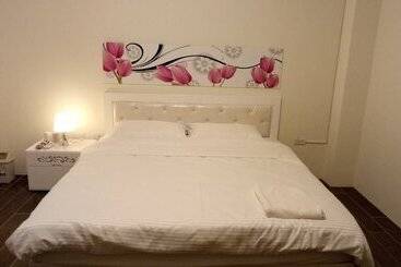 تختخواب و صبحانه Yuanshan Dahu Homestay
