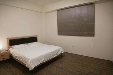 تختخواب و صبحانه Yuanshan Dahu Homestay