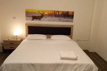 تختخواب و صبحانه Yuanshan Dahu Homestay