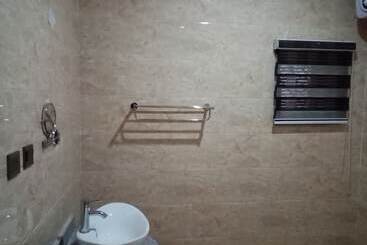 هتل Mozida Suites