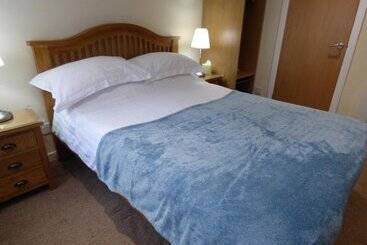 تختخواب و صبحانه The Brevins Guest House