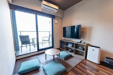 هتل Livemax Resort Atamiseafront