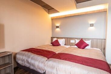 هتل Livemax Resort Atamiseafront