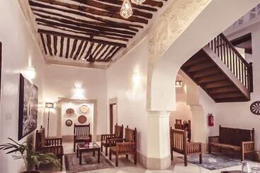 تختخواب و صبحانه Smiles Stone Town
