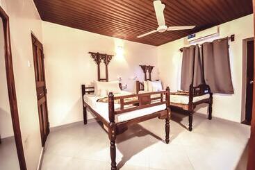 تختخواب و صبحانه Smiles Stone Town