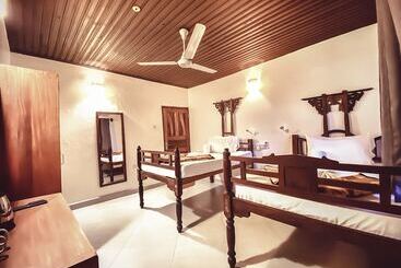تختخواب و صبحانه Smiles Stone Town