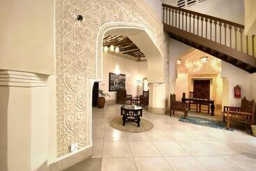 تختخواب و صبحانه Smiles Stone Town