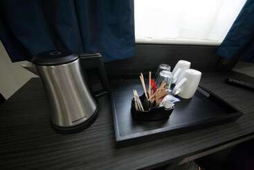هتل The Pack And Carriage London