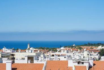 Lighthouse View In Cascais