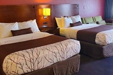 فندق Olympic Inn & Suites