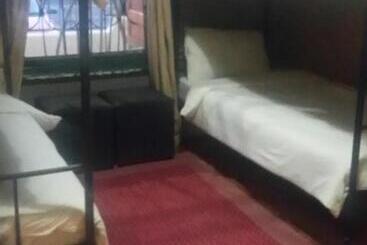 هاستل Stumble Inn Backpackers Lodge