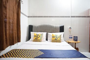 هتل Spot On 1854 Sepinggan Asri Syariah Guesthouse