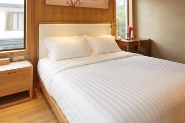 پانسیون Floral Hotel Joyful Garden Hangzhou