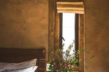 تختخواب و صبحانه Guyue Caotang Inn