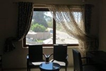 تختخواب و صبحانه Aabiya Lodge