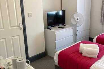 تختخواب و صبحانه Wilson Lodge
