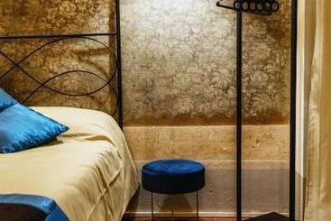 تختخواب و صبحانه Ca De Guelfi Residenza D'epoca